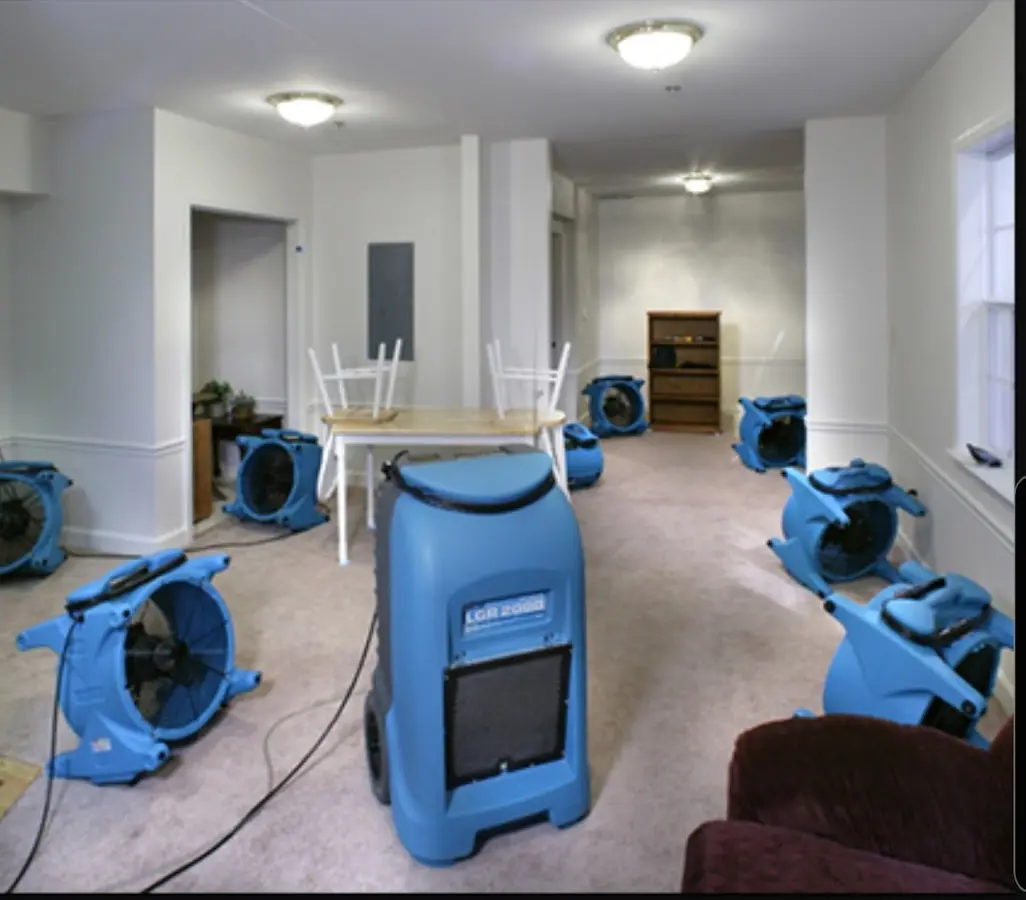 Air movers and dehumidifier setup for Water Damage Restoration in Allouez